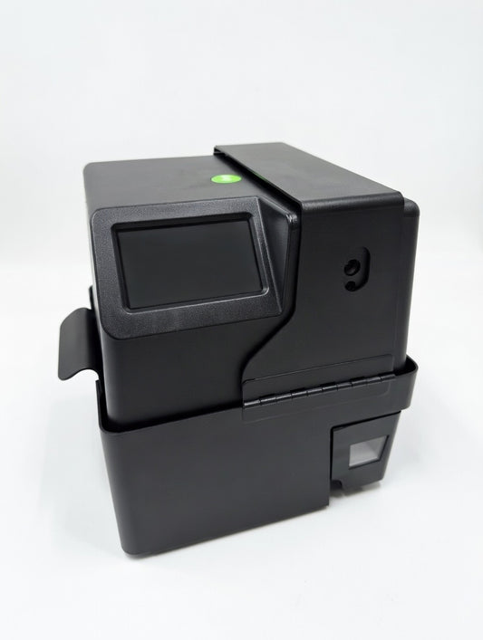 MedaCube device sits in black MedaCube metal security case viewed from the left.
